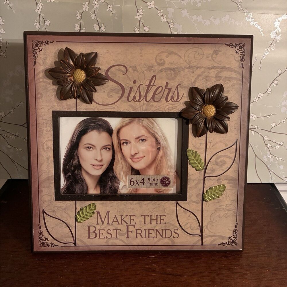 Picture Frame “SISTERS MAKE THE BEST FRIENDS” w/ Metal Flowers. 10”x10” Frame